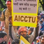 Indian unions and farmers stage a nationwide strike over interim trade deal with US