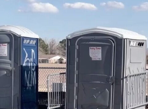 Woman charged with dumping newborn baby in portable toilet