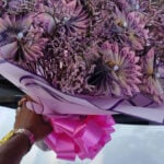 In Zimbabwe, cash bouquets and scrap metal gifts rival flowers as coveted Valentine's tokens of love