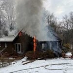 Amazon driver calls 911, helps save 84-year-old woman from burning home