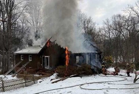 Amazon driver calls 911, helps save 84-year-old woman from burning home