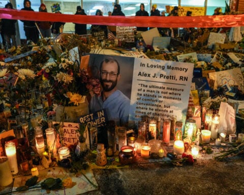 Minneapolis left to decide future of streetside memorials to 2 people killed by federal officers