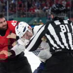 Tom Wilson fights in Canada's game vs. France at the Olympics
