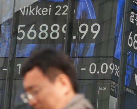 World shares mostly advance and Japan falls ahead of Lunar New Year holidays