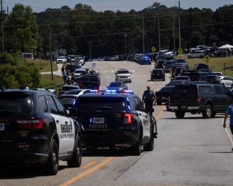 Prosecutors say Georgia father bought his teen a gun despite warning signs before 2024 school shooting