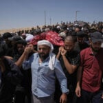 Prosecutors plan to charge an Israeli settler with killing a Palestinian activist in the West Bank