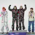 Austria wins gold in 1st Olympic men's super team ski jump as event is shortened due to weather