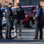 Police credit a good Samaritan for ending a deadly shooting at a Rhode Island ice rink