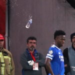 Madrid game at Benfica halted for several minutes as Vinícius says opponent racially insulted him