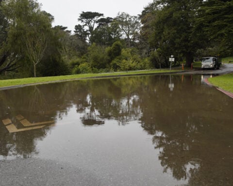 California walloped by winter storm with high winds and heavy rain and snow