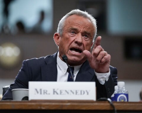 Moderna says the FDA will consider its new flu shot after resolving a public dispute