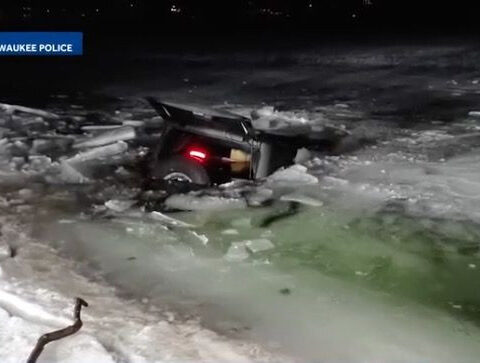 Tow crews recover SUV after it falls through ice on Wisconsin lake