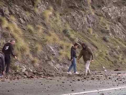 Drivers get out to clear debris as Highway 1 closure turns Big Sur travelers around