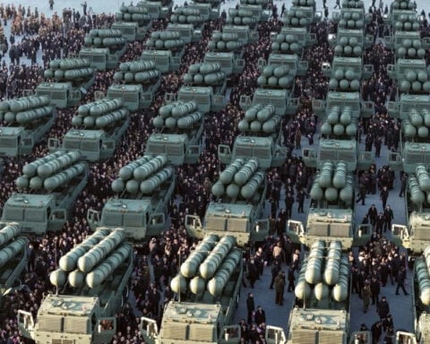 North Korea shows Kim Jong Un at the wheel of a mobile rocket launcher