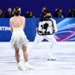 Skating backwards in an all-white suit: Meet the accidental star of this year’s Winter Olympics