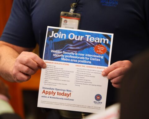 US applications for jobless aid fall to 206,000 last week as layoffs remain low