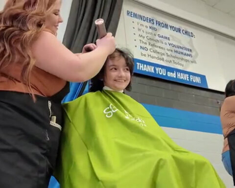 Community shaves heads, raises $20,000 for childhood cancer research
