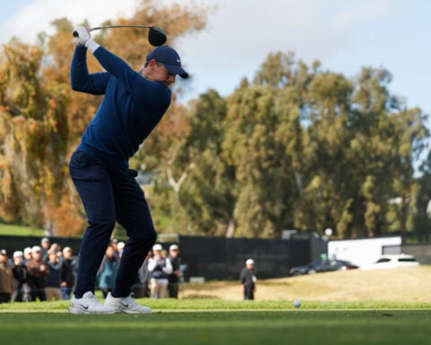 Rory McIlroy handles the rain and then wind to share clubhouse lead at Riviera