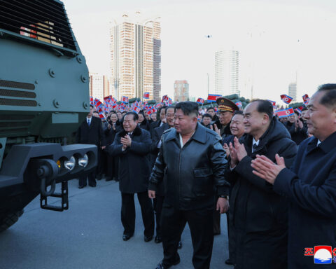 Kim lauds North Korea's economy and regional standing as major party meeting opens