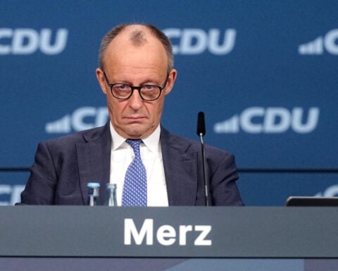 German leader to make his 1st visit to China next week as country seeks 'right balance' in ties