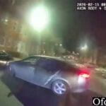 Baltimore police release bodycam video showing stolen car hitting officer, fleeing