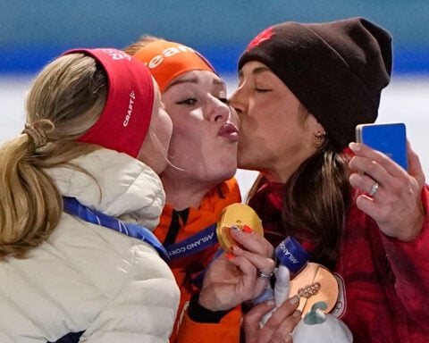 Dutch fans roar for speedskater Antoinette Rijpma-de Jong's Olympic gold in the 1,500