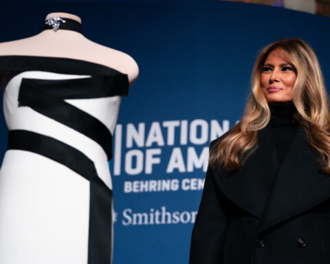 Melania Trump donates her white and black-trimmed inaugural ball gown to the Smithsonian