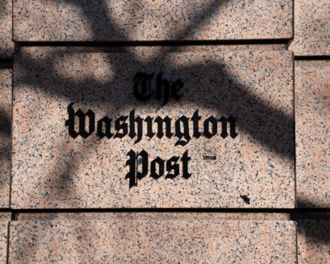 Judge weighs Washington Post's demand for government to return devices seized from reporter's home
