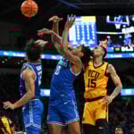 Thames leads second-half rally, No. 18 Saint Louis beats VCU 88-75 as benches empty