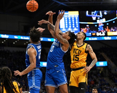 Thames leads second-half rally, No. 18 Saint Louis beats VCU 88-75 as benches empty