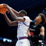 Thiam scores career-high 28 to lead Cincinnati to an 84-68 upset of No. 8 Kansas