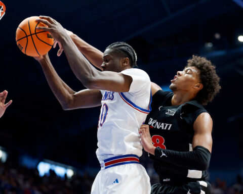 Thiam scores career-high 28 to lead Cincinnati to an 84-68 upset of No. 8 Kansas