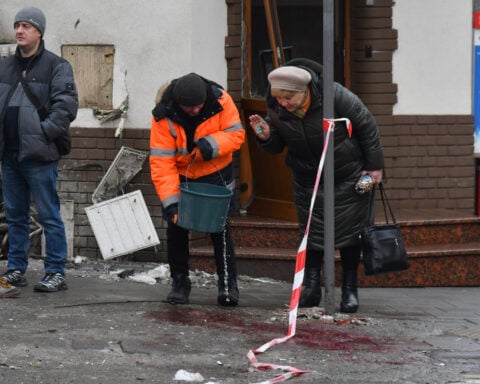 Russian missile and drone barrage hits Kyiv suburbs, killing 1