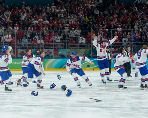 Hughes scores in overtime as US beats Canada for first men's hockey gold at the Olympics since 1980
