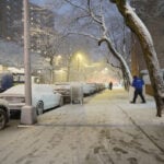 New York City hunkers down under blizzard warnings and a travel ban as winter storm hits Northeast