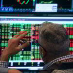 Dow sinks more than 700 points as tariff uncertainty roils markets