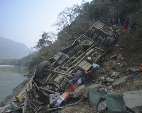 A packed bus plunges off a Nepal highway, killing 19 and injuring 25