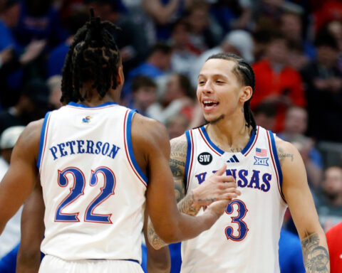 White scores 23 as No. 14 Kansas rebounds with 69-56 win over No. 5 Houston