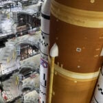 NASA opts to roll back moon rocket and delay crew’s historic trip into deep space