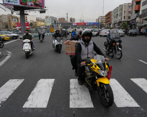 Iranians worry over American military buildup as last-chance round of talks nears