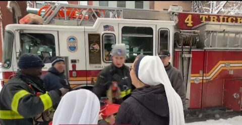 Nuns thank firefighters for clearing trees toppled during the blizzard