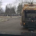 Ohio sanitation worker finds wanted suspect hiding in trash can