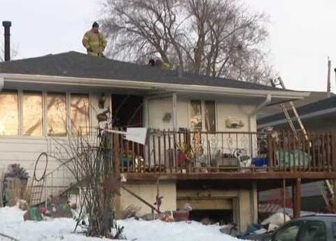 Omaha firefighters rescue elderly woman from house during basement fire