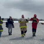 Detroit first responders rescue Siberian Husky stranded on ice near bridge