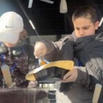 TwoGuys Brewing in Wyoming & middle school students team up to feed neighbors in need