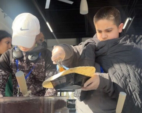 TwoGuys Brewing in Wyoming & middle school students team up to feed neighbors in need