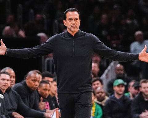 Pat Riley revives the NBA coach suit debate. Erik Spoelstra wants to keep sideline wear casual