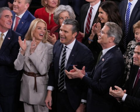 The Latest: Trump lays out his midterm agenda at the State of the Union