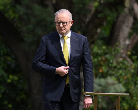 Australian leader evacuated from residence following bomb threat linked to opponents of group banned in China