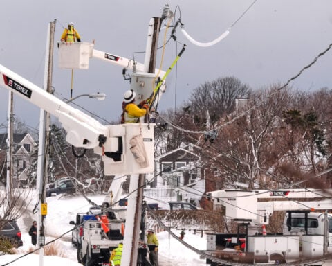 Power outages, piles of snow vexing parts of Northeast in snowstorm aftermath